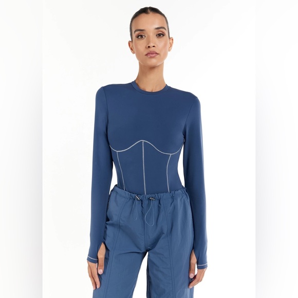 The Giving Movement Corset Long-Sleeve
Softskin100 Bodysuit - Picture 2 of 6